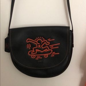 COACH x Keith Haring saddle bag